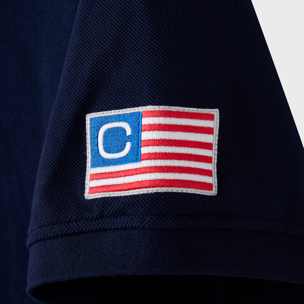 GLO NAVY POLO